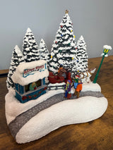 Left side of 2026 Thomas Kinkade Teleflora Christmas Collectible