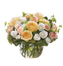 This Magic Moment Bouquet of pastel roses and spray roses in glass bubble bowl