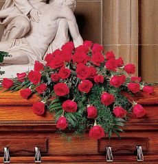 Blooming red roses casket spray of flowers
