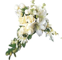 Elegant remembrance casket adornment of white roses and lilies
