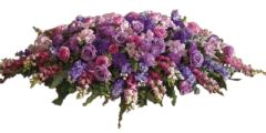 Funeral flower casket spray of all lavender and purple flowers