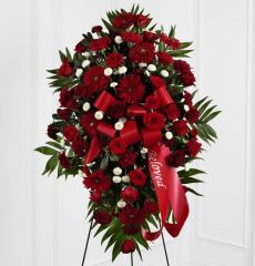 Red and white funeral flower standing spray with red bow Large