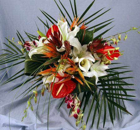 Tropical exotic flower bouquet with orchids, bird of paradise and anthurium