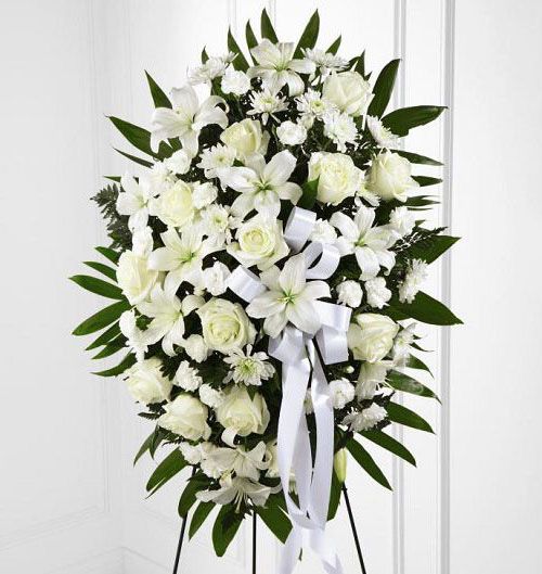 All white flowers in funeral standing spray Small