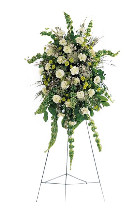 Funeral flower standing spray with green, lime, cream and white flowers