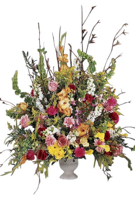 One sided funeral flower arrangement with assorted bright flowers