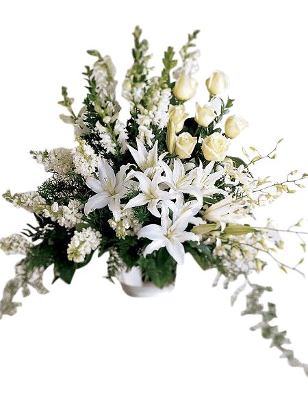All white funeral flower arrangement with lilies and roses
