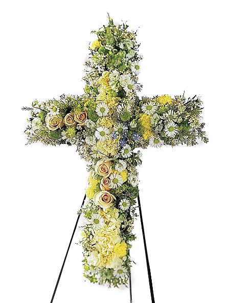 Funeral cross of white, yellow and cream flowers