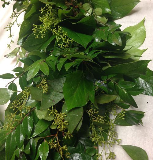 Foliage garland of mixed greens for table or mantle