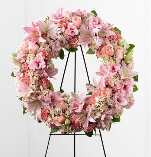 Loving Remembrance Funeral Flower Wreath with assorted pink roses, lilies and hydrangea