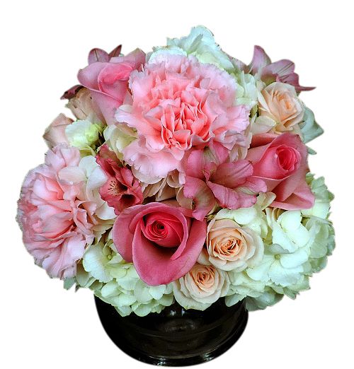 Assorted pinks and whites in a clutch bouquet for prom