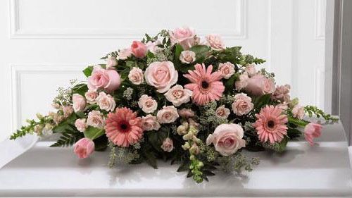 Sweet Farewell Funeral Flower Casket Spray with assorted pink flowers Small