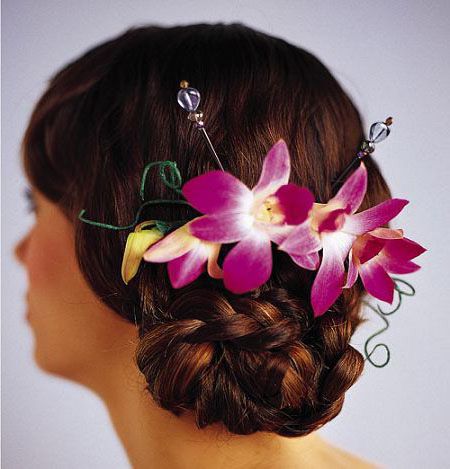 Headpiece of purple and white orchids